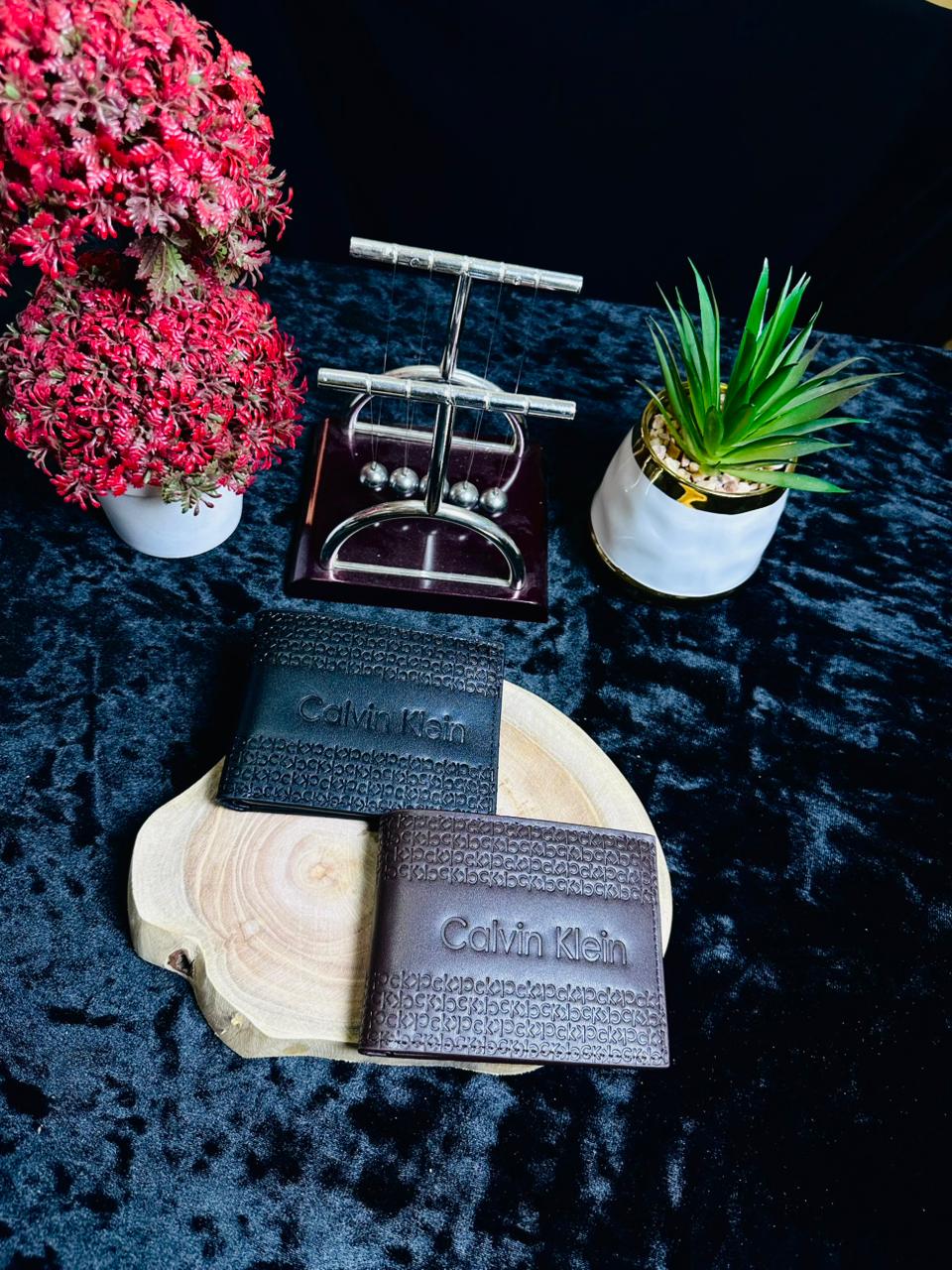 C.K Classic Embossed Bi-Fold Wallet – Signature Monogram Series