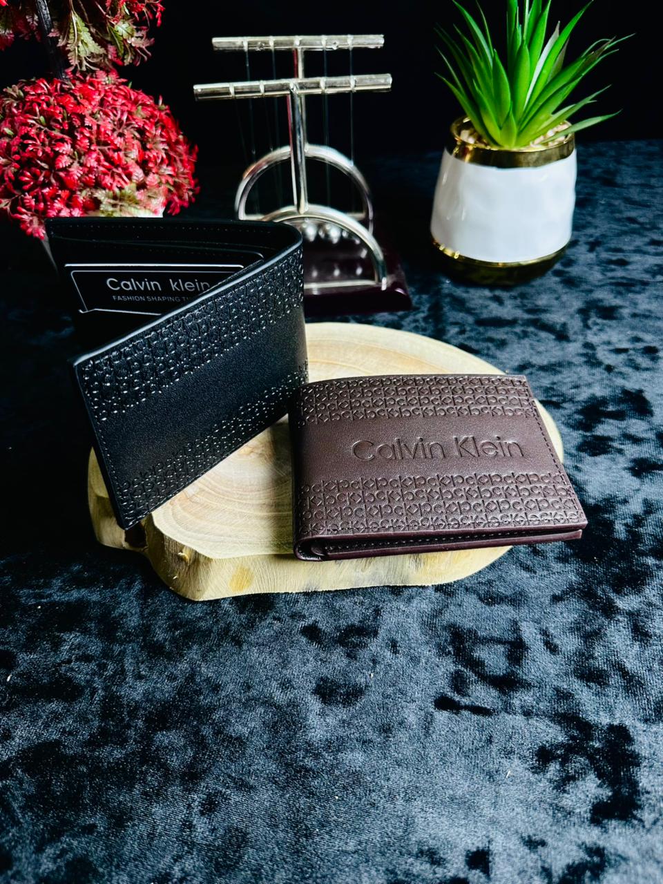 C.K Classic Embossed Bi-Fold Wallet – Signature Monogram Series
