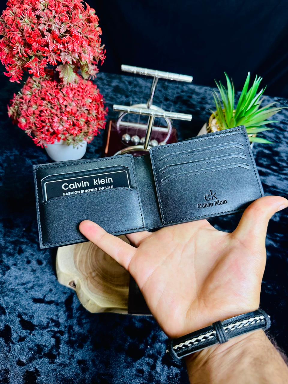 C.K Classic Embossed Bi-Fold Wallet – Signature Monogram Series